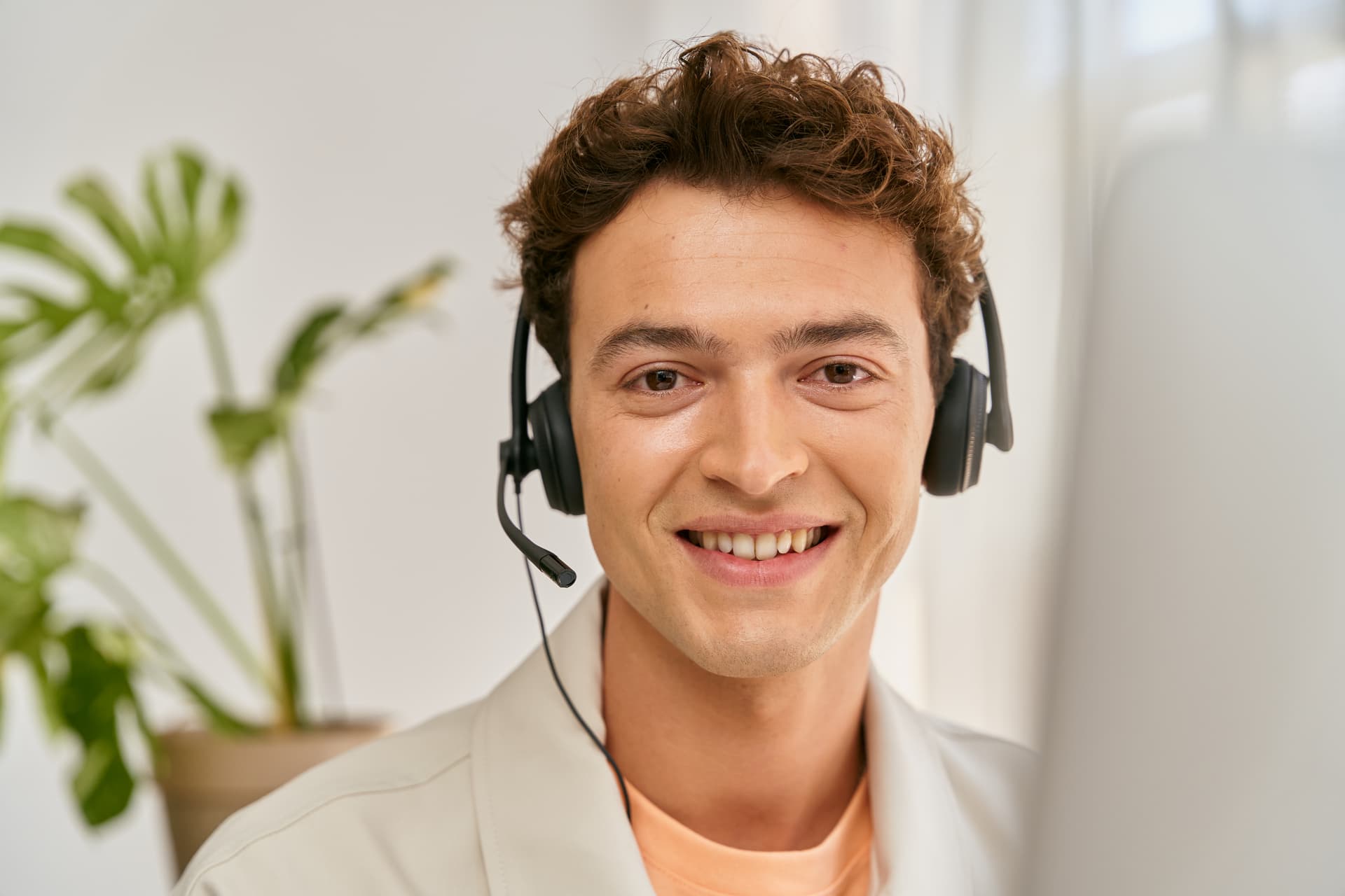 male-receptionist-smiling