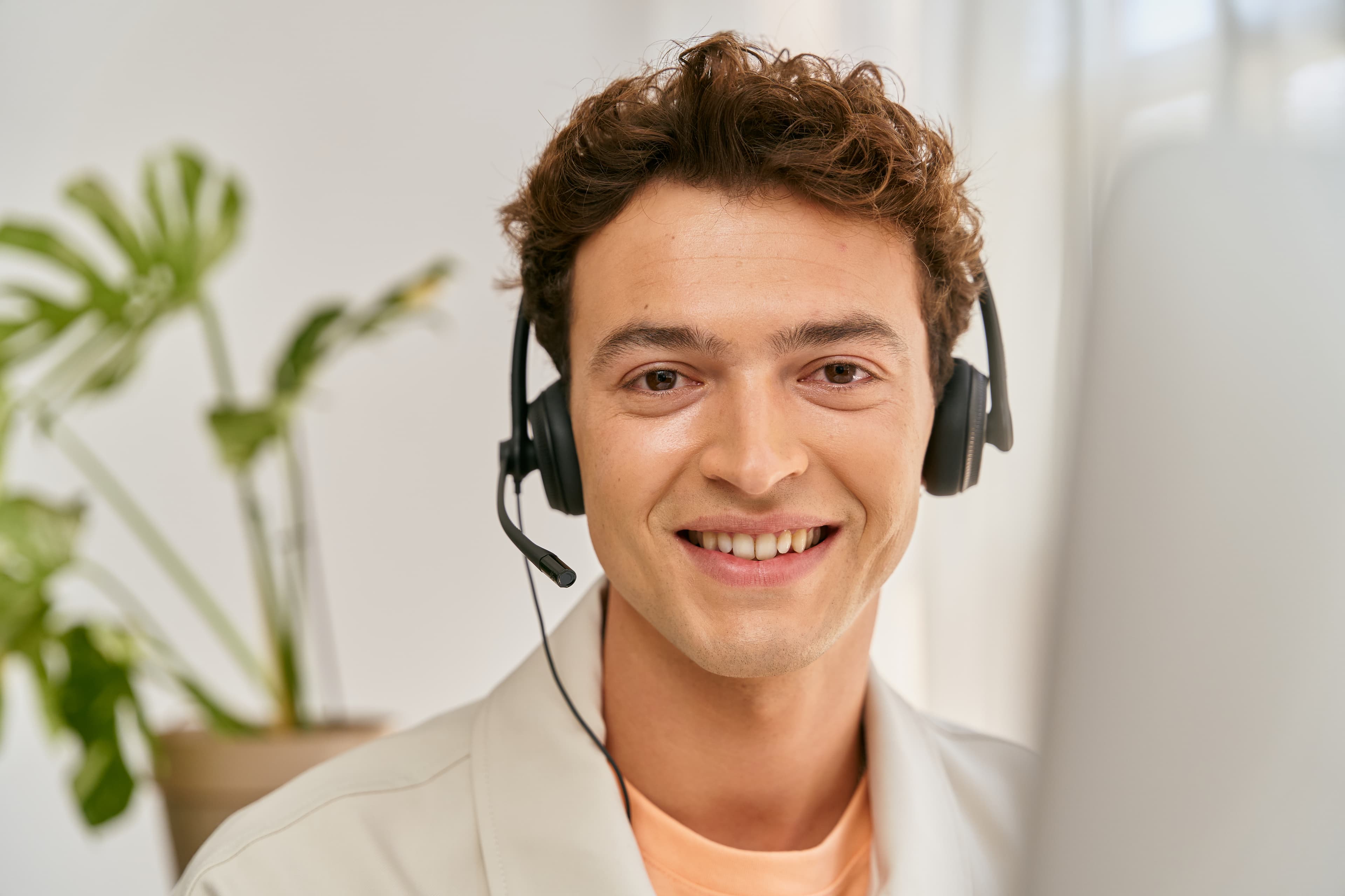 male-receptionist-smiling