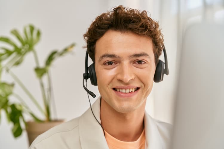 male-receptionist-smiling